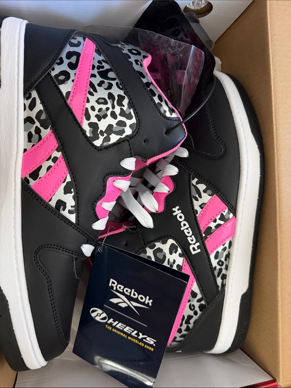 Reebok X HEELYS Women’s Black, White & Pink High-Top Sneakers with Leopard Print